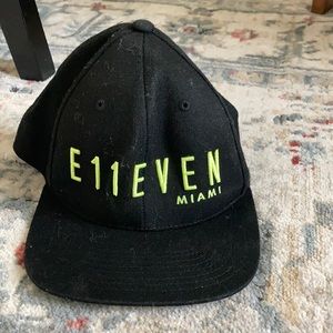 Black baseball cap. From famous Eleven  night club in Miami. They sell for $50.